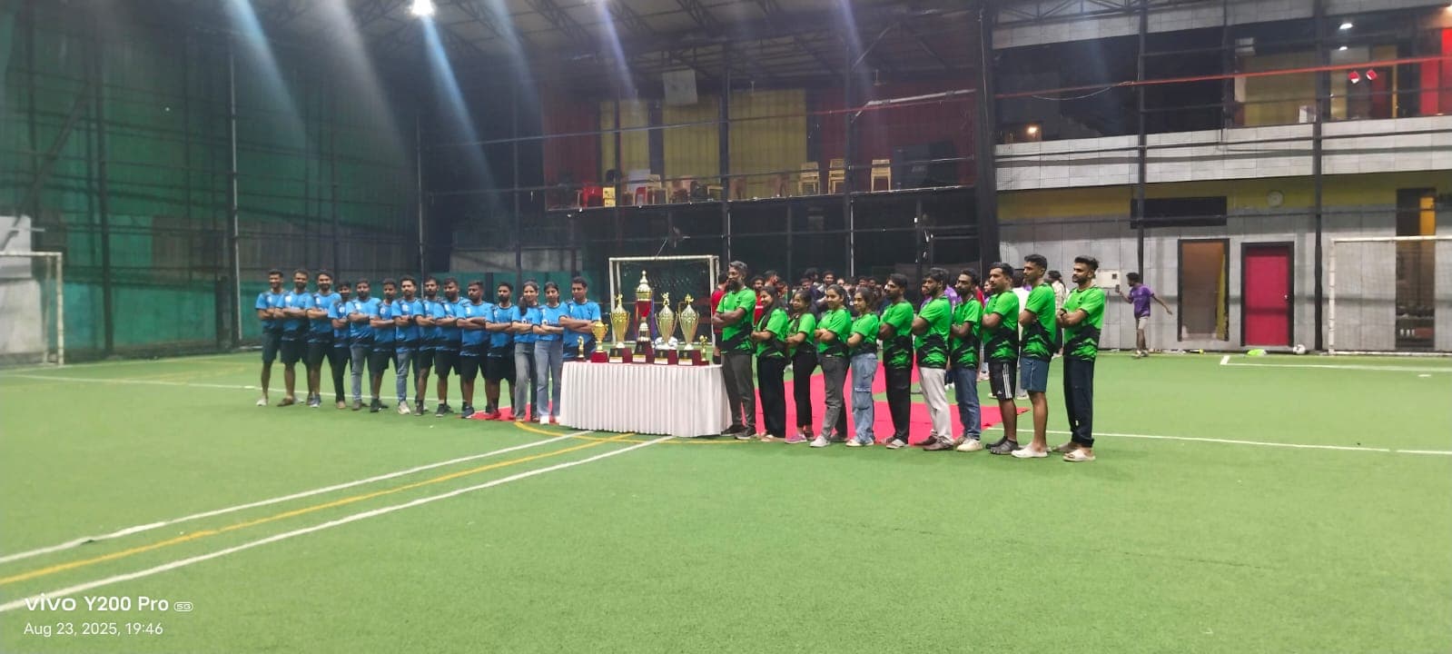 Corporate sports league team line-up with trophies managed by Red Q Events