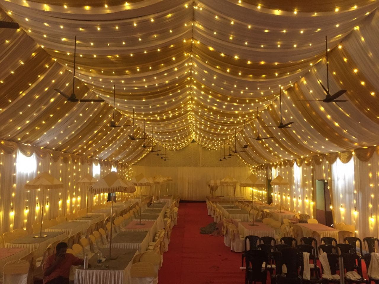 Elegant fairy-light wedding canopy created by Red Q Events in Kerala